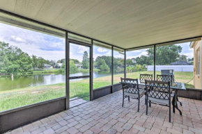 Lanai and Pond at Tranquil Bradenton Retreat!